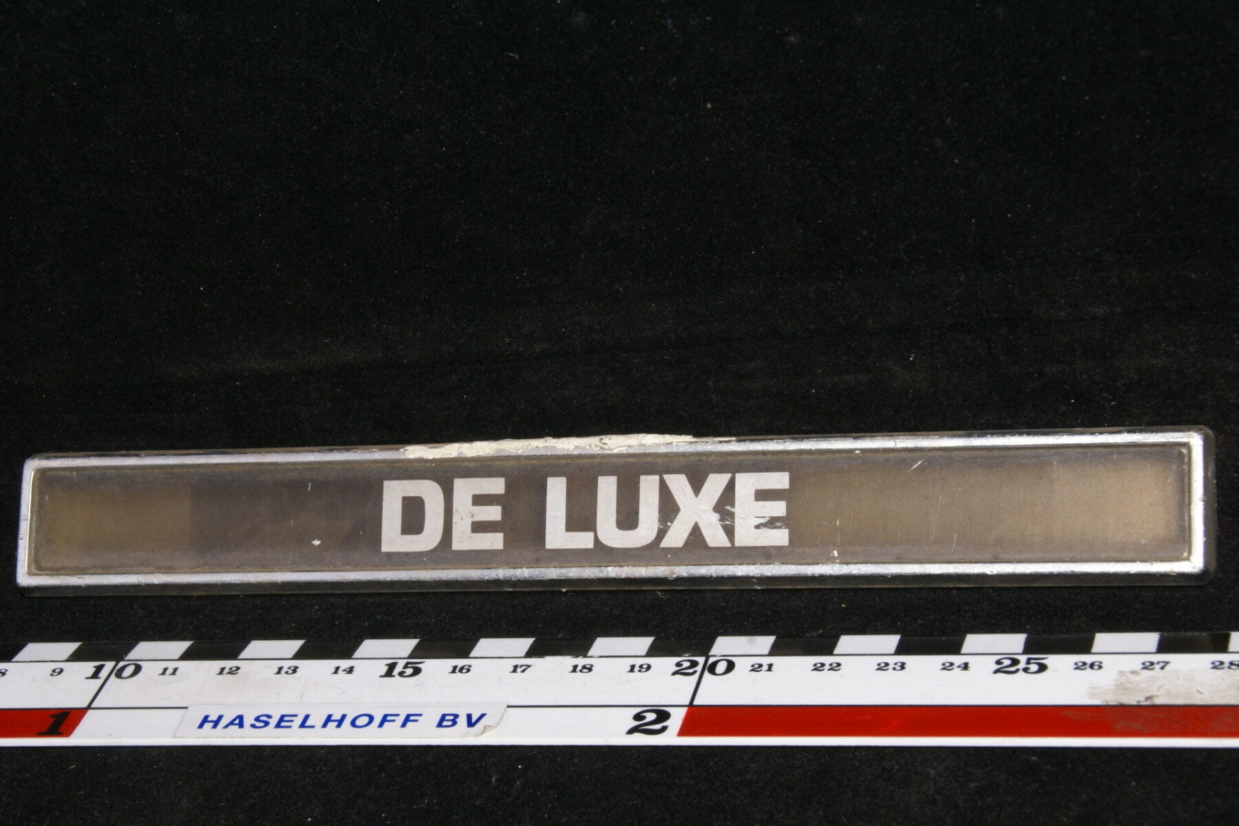 koffer embleem DE LUXE 141100-0427-0