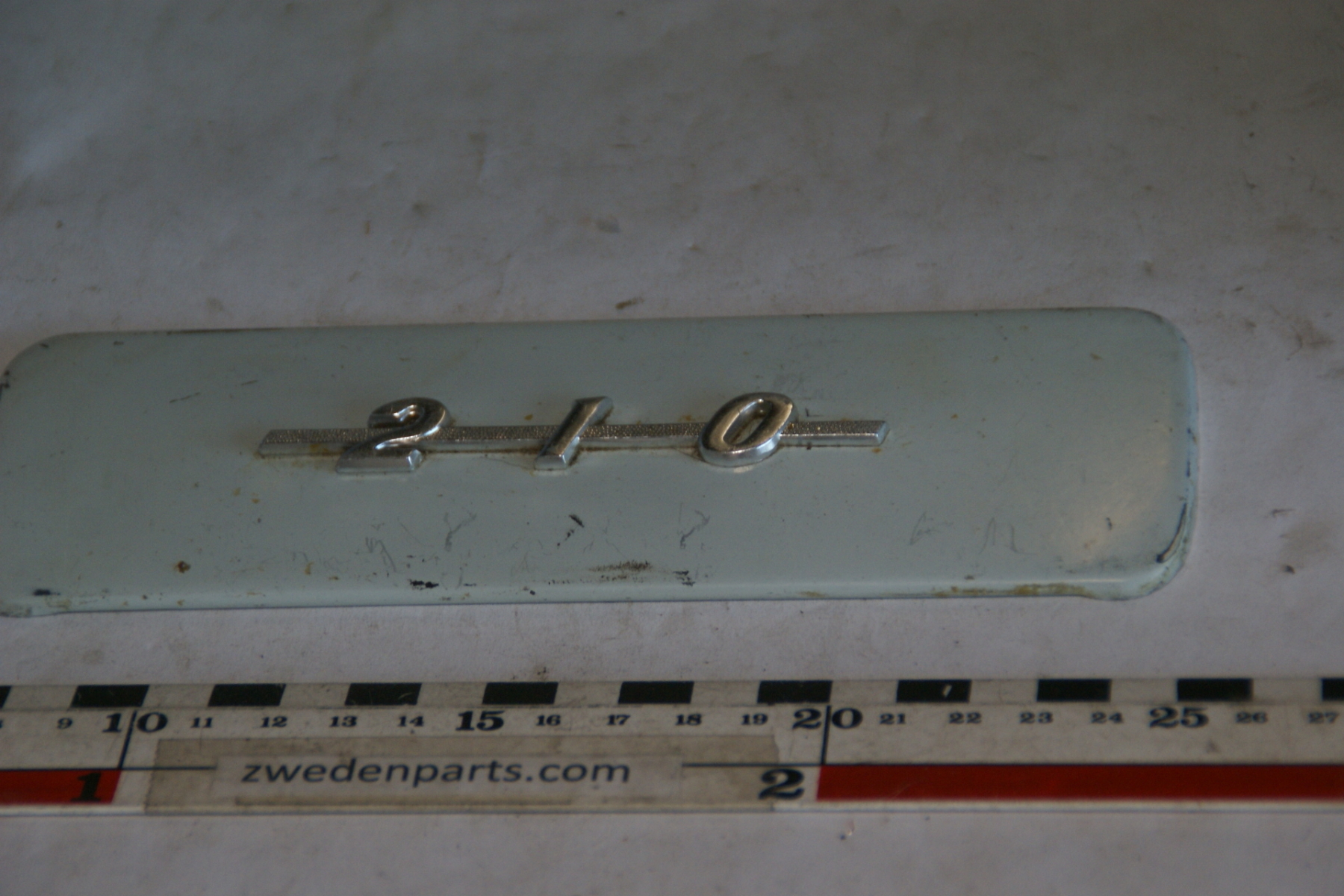 DSC05688 radioplaat RVS, iceblue gelakt origineel Volvo 210 Duett